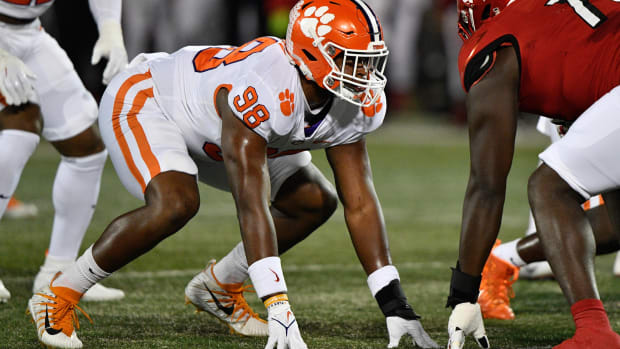 Nov 6, 2021; Louisville, Kentucky, USA; Clemson Tigers defensive end Myles Murphy (98) lines up against the Louisville Cardinals during the first quarter at Cardinal Stadium. Clemson defeated Louisville 30-24. Mandatory Credit: Jamie Rhodes-USA TODAY Sports